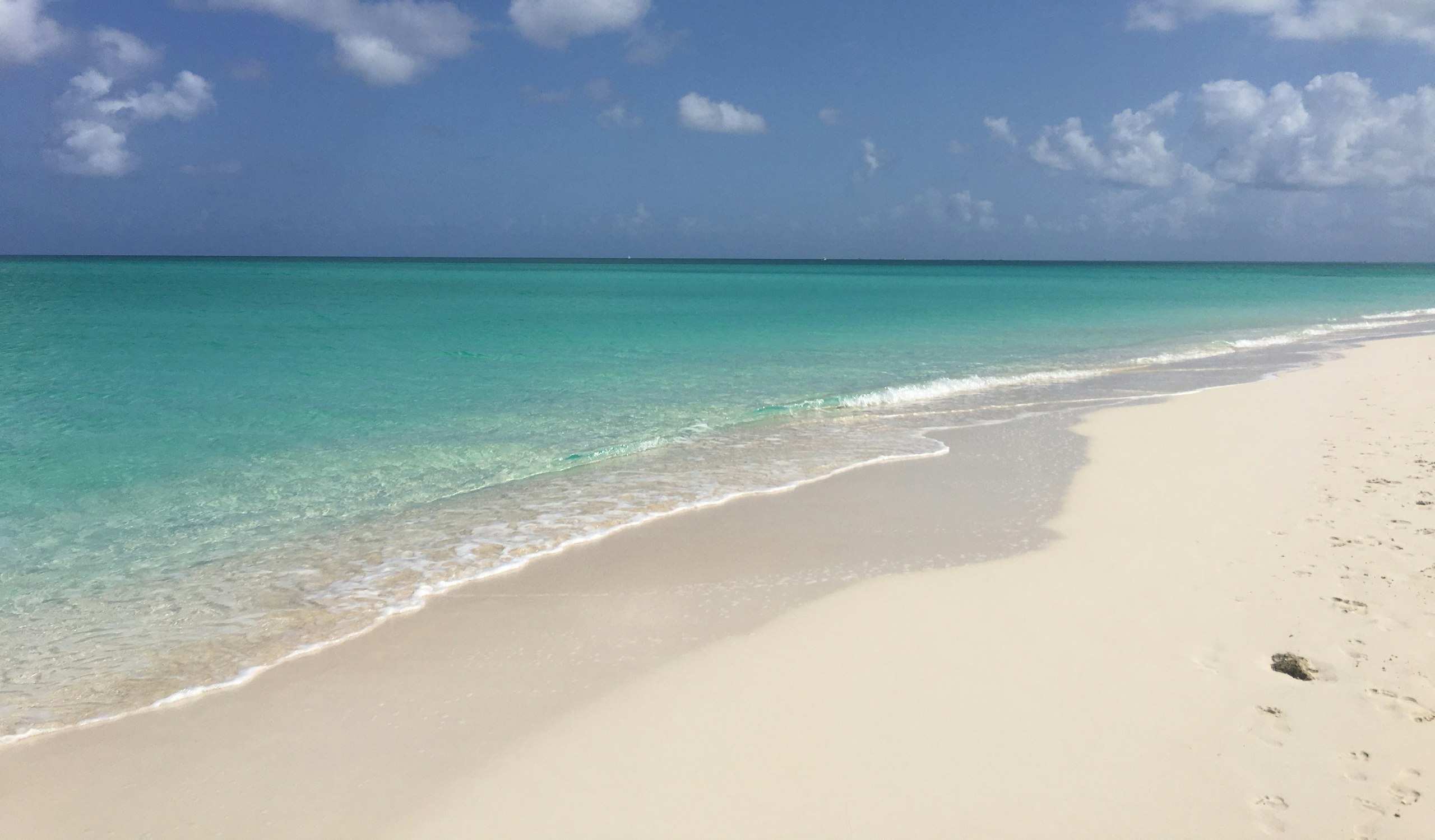Brilliant white sand and vivid turquoise water at Grace Bay, Turks & Caicos