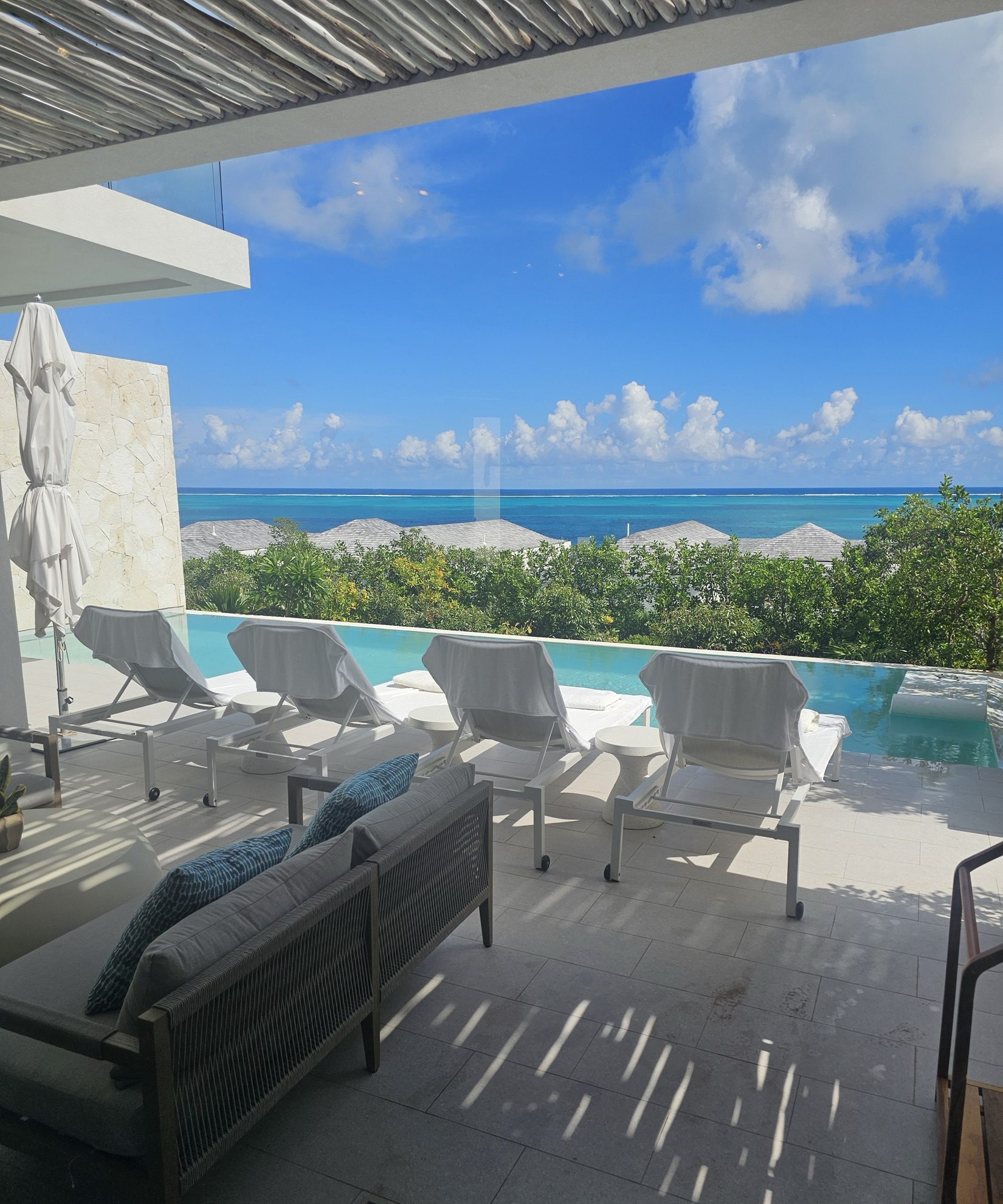 Pool veranda with ocean view, by Juanita Harris